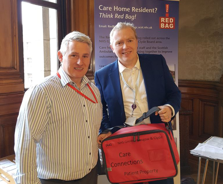 Alan Gilmour and Stephen Fitzpatrick with the red bag.