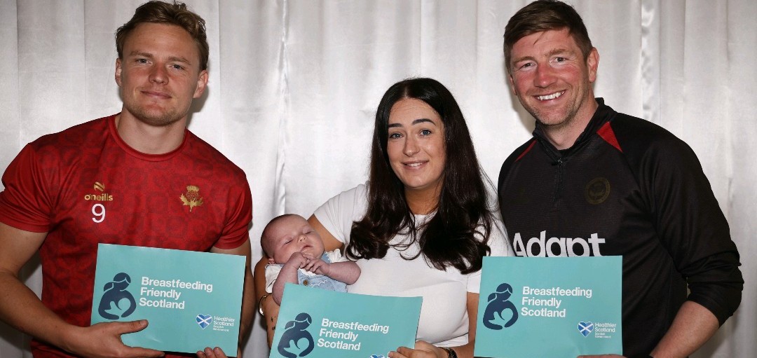Partick Thistle's Mark Wilson, Football Manager, Alannah McPherson, Head of Medical, with her baby Poppie, and first-team player Alex Samuel pose for pictures.