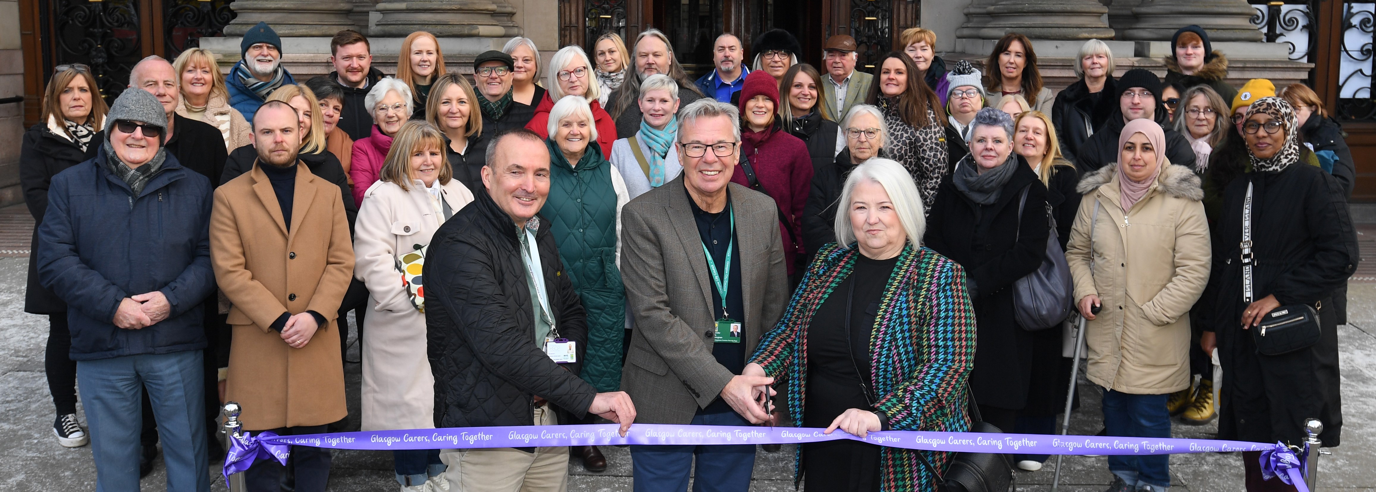 Image of ribbon cutting ceremony outside City Chambers