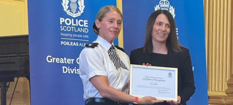 Nicola Milligan receives award from Chief Superintendent Lynn Ratcliff