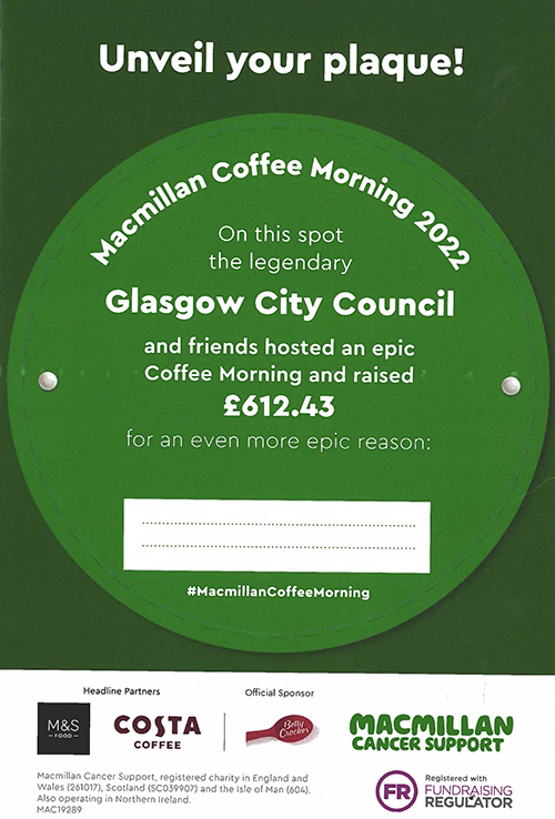 Plaque from Macmillan Cancer Support with total amount raised